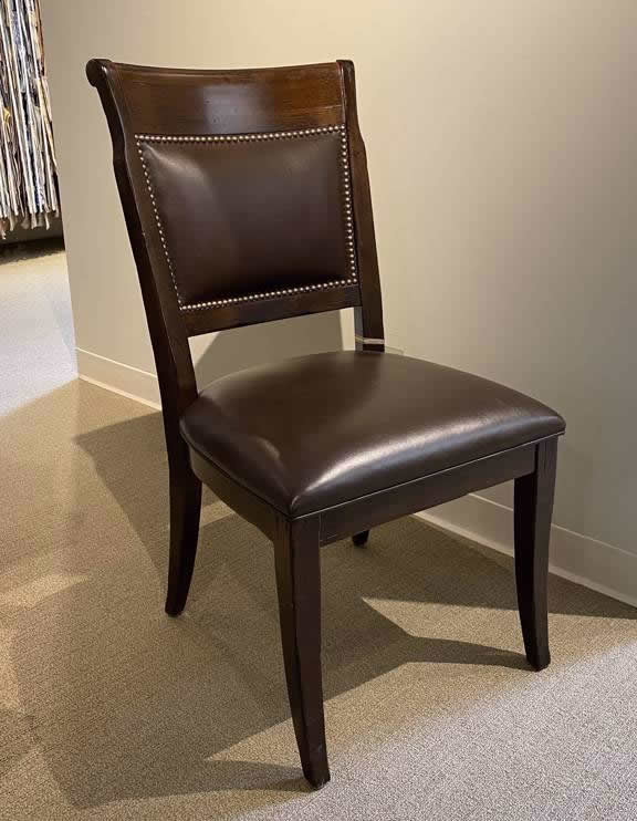 The Lorts Model #9827 is a custom, high-end dining side chair.