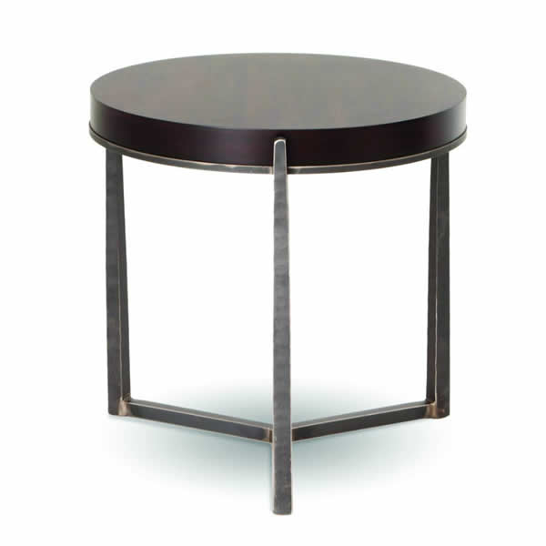 The Cooper table is hand-hammered and shaped by skilled craftsmen.