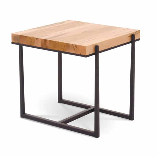 The Cooper table is hand-hammered and shaped by skilled craftsmen.